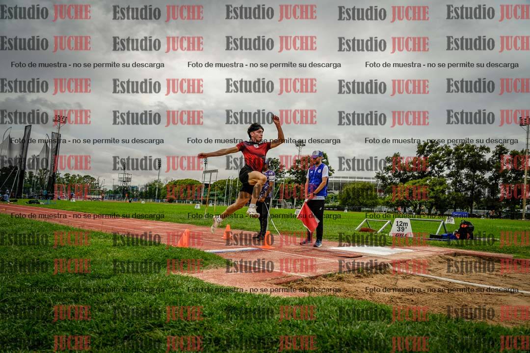 Fotos del salto en largo de varones