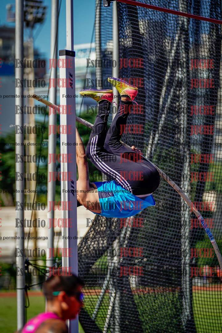 Fotos del salto triple de mujeres y varones