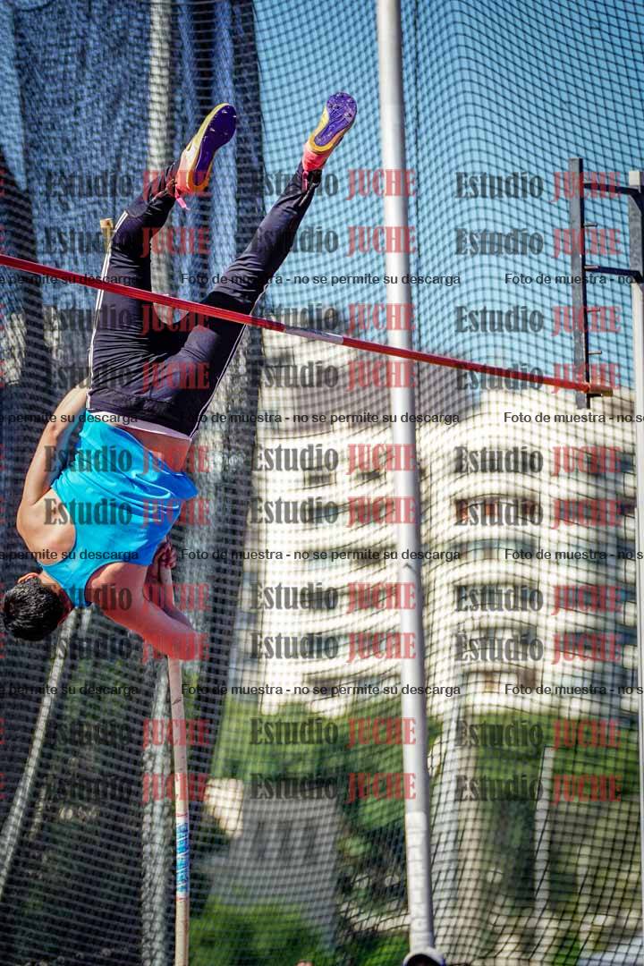 Fotos del salto triple de mujeres y varones