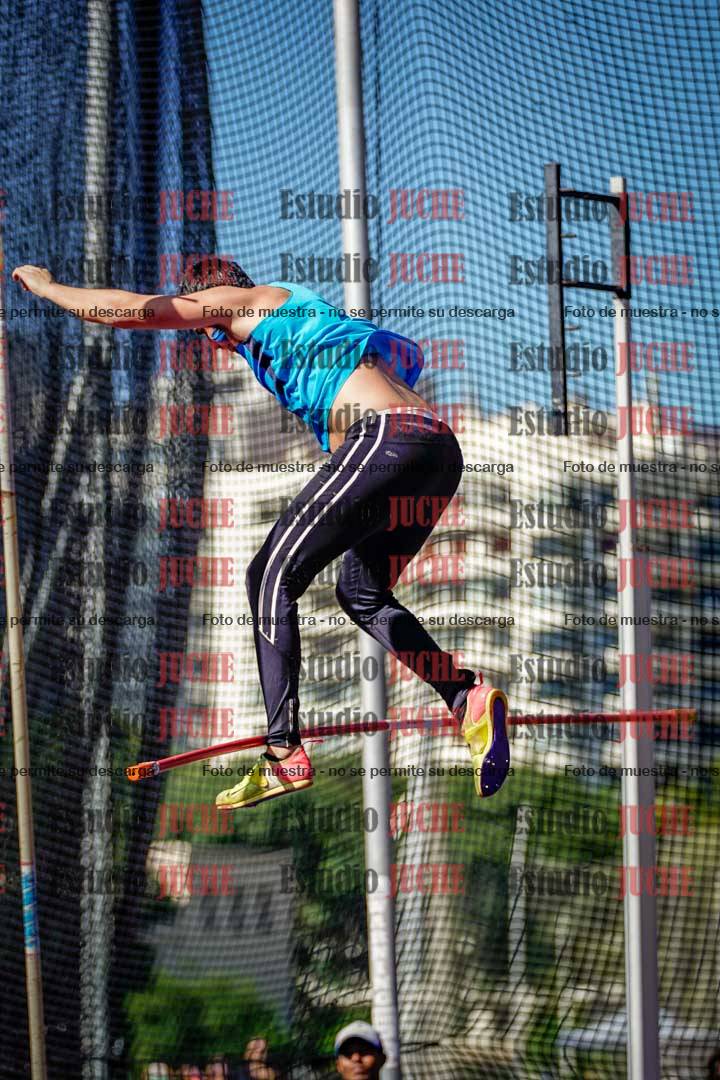 Fotos del salto triple de mujeres y varones
