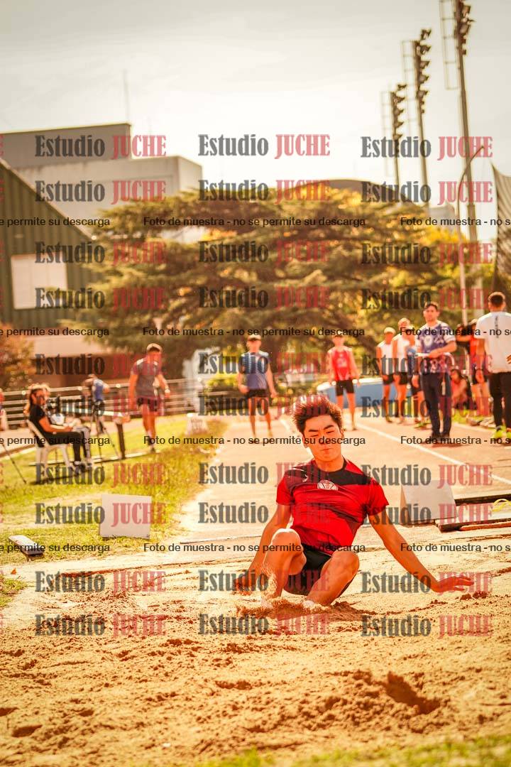 Fotos del salto en largo de varones