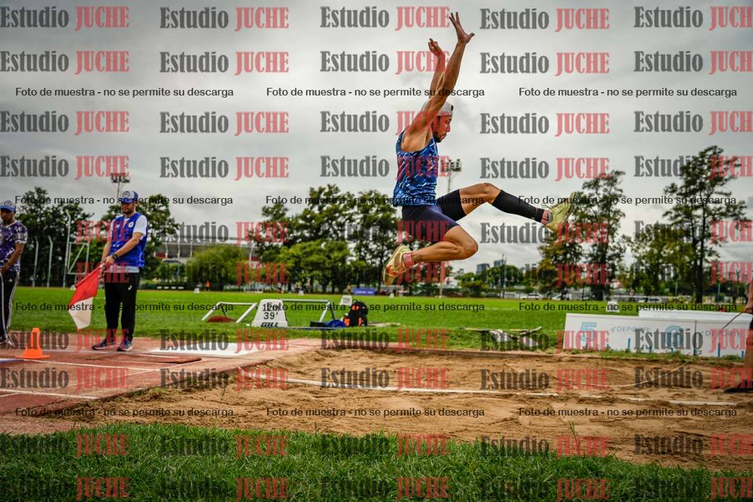 Fotos del salto en largo de varones