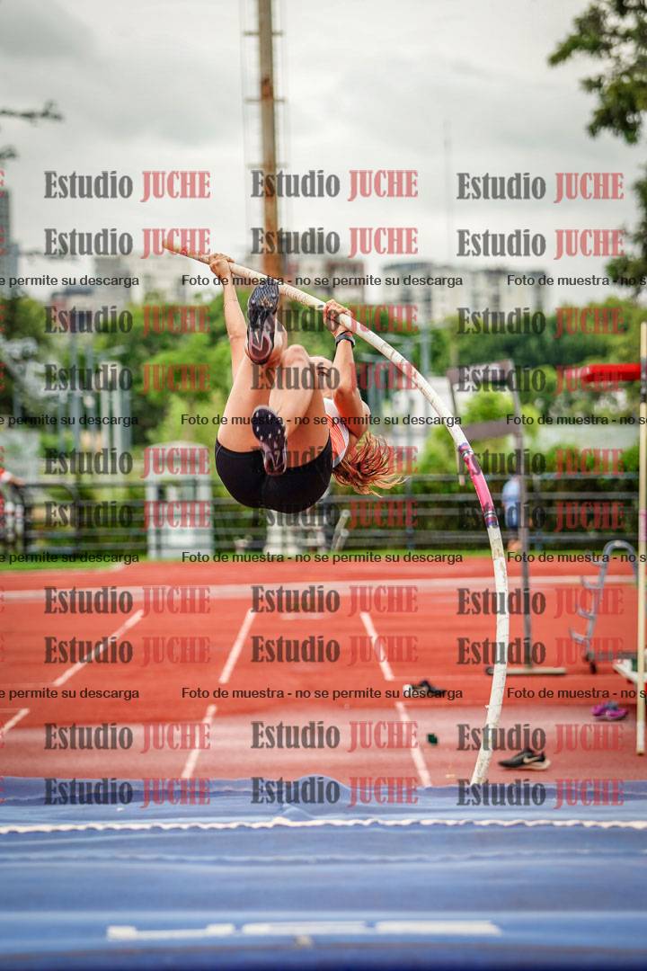 Fotos del salto con garrocha de mujeres y varones
