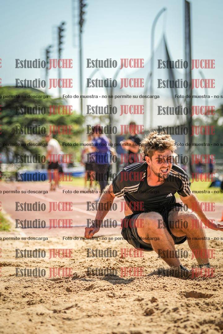 Fotos del salto en largo de varones