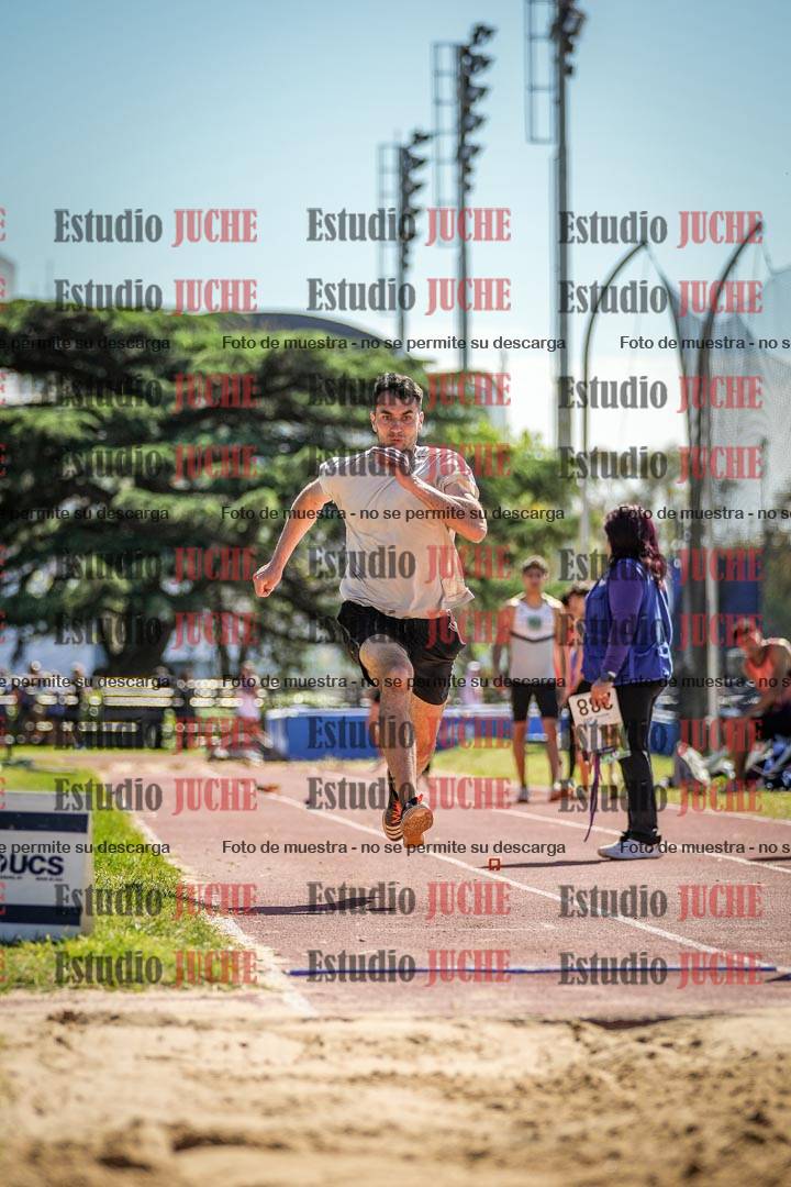 Fotos del salto en largo de varones