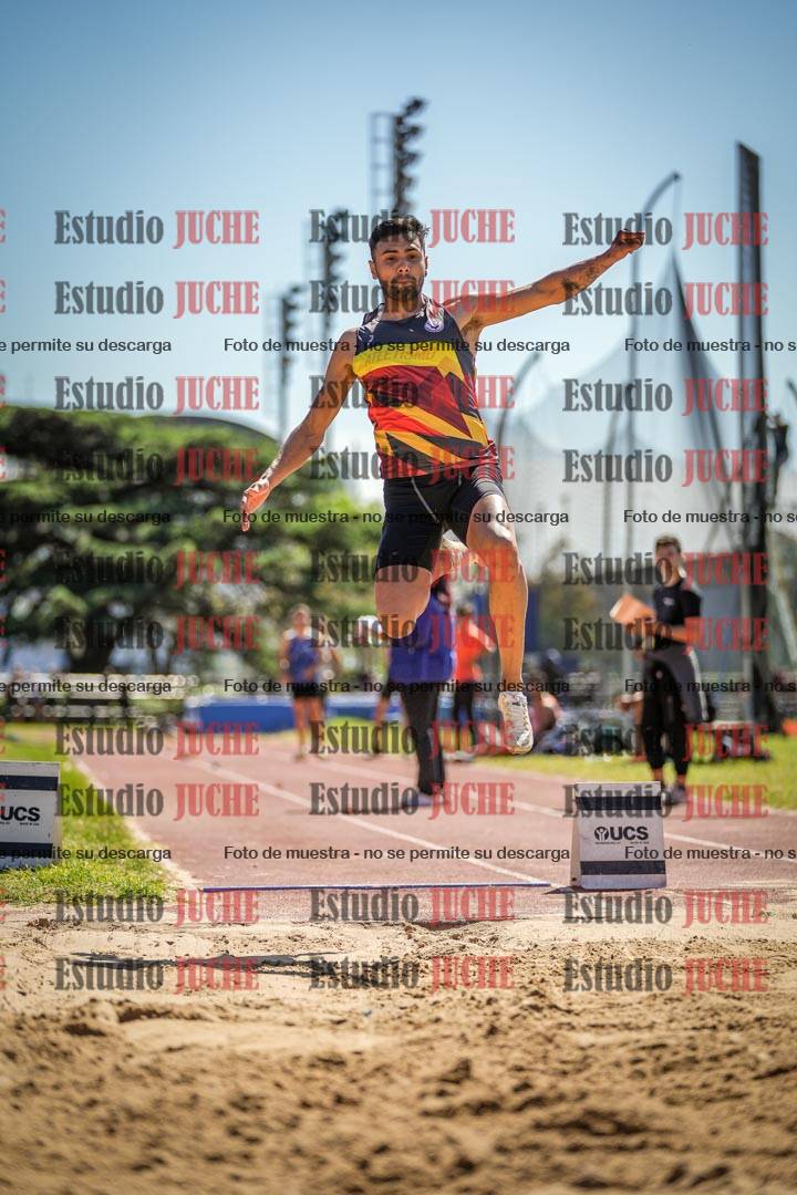 Fotos del salto en largo de varones