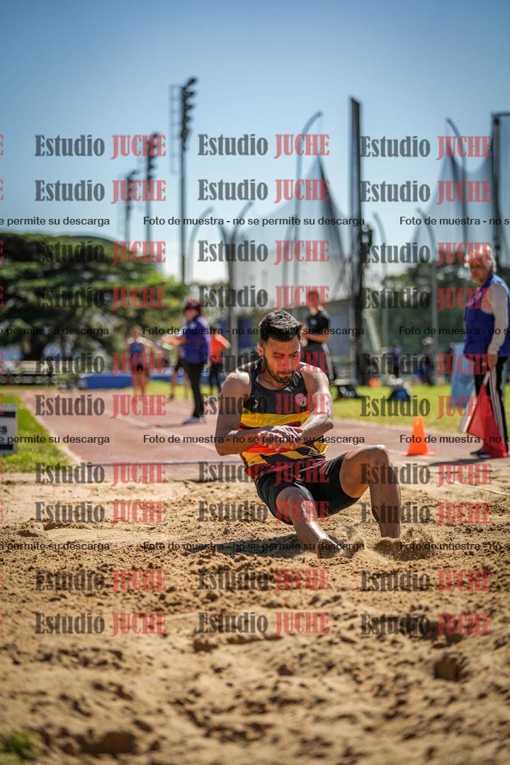 Fotos del salto en largo de varones