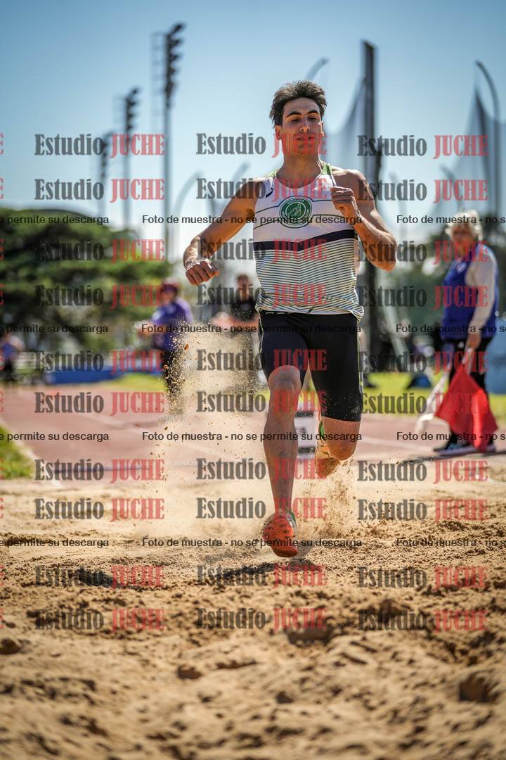 Fotos del salto en largo de varones