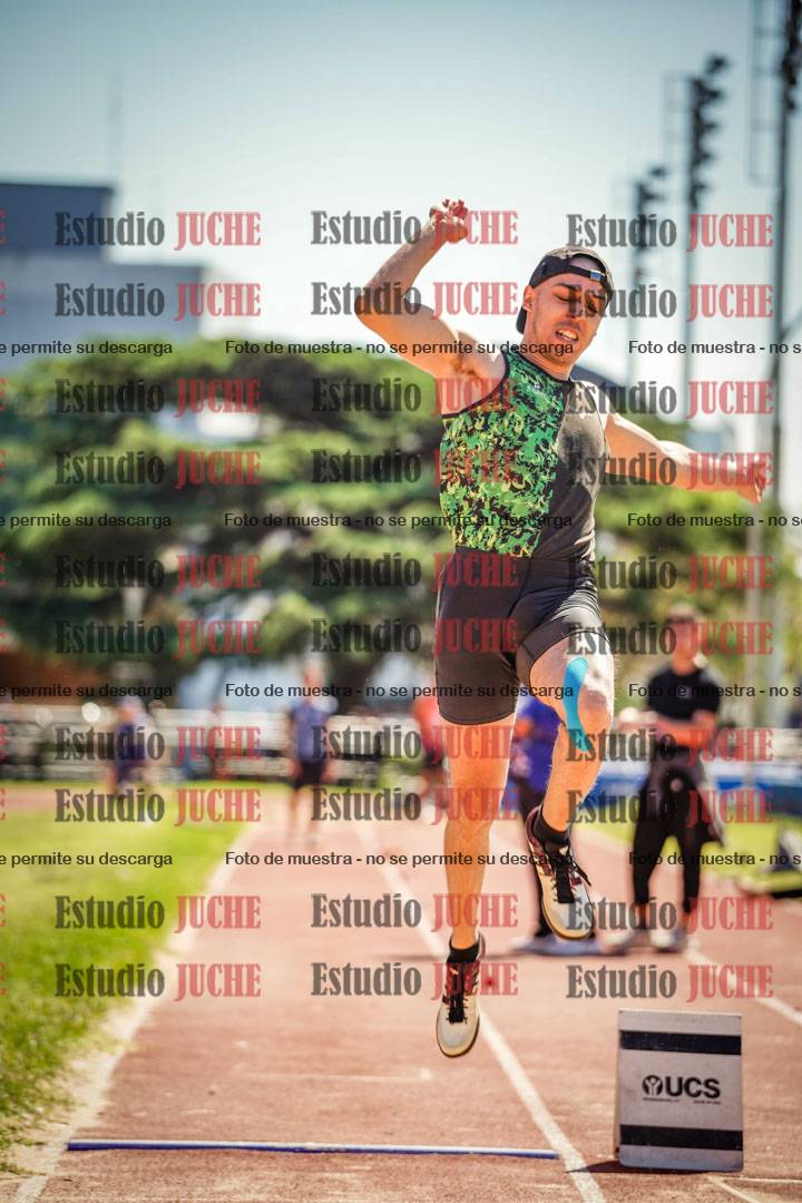 Fotos del salto en largo de varones