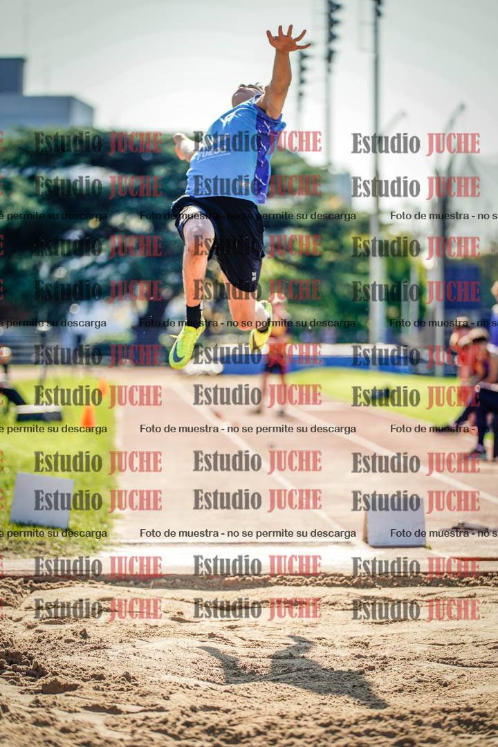 Fotos del salto en largo de varones