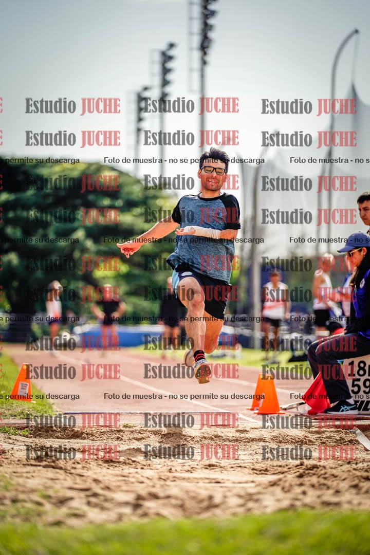 Fotos del salto en largo de varones