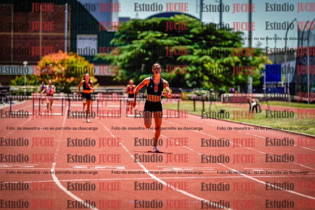Fotos de los 400 m con vallas de mujeres