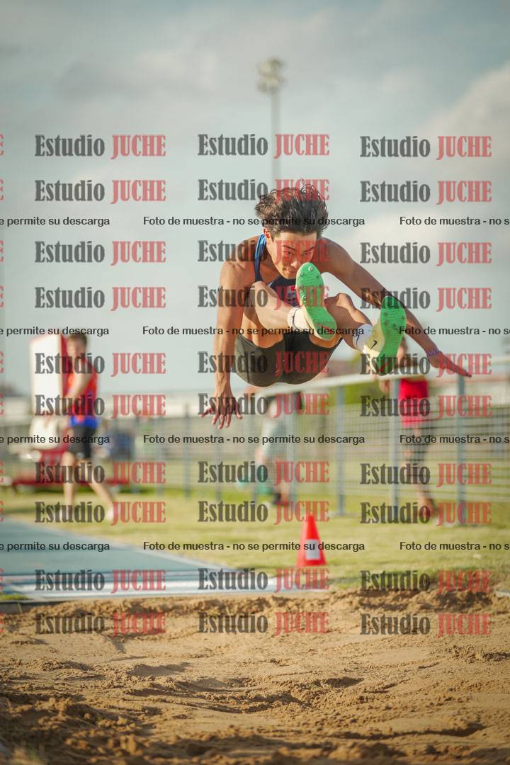 Fotos del salto en largo de varones