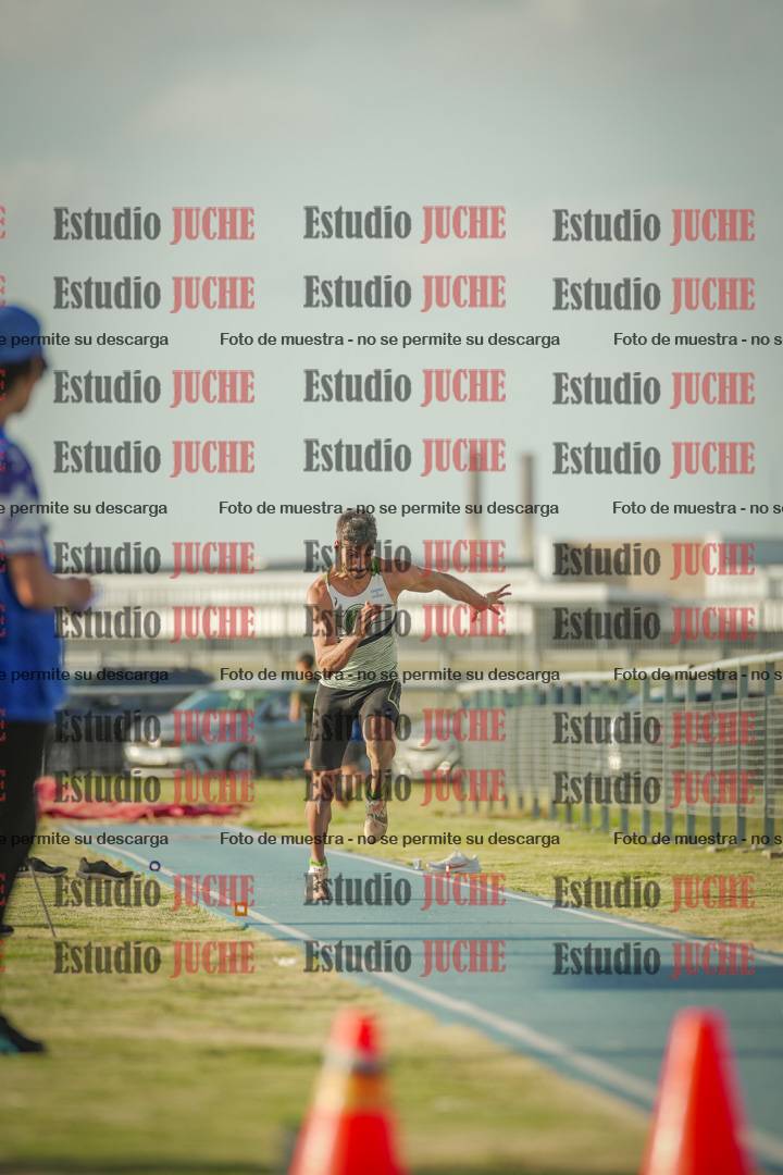 Fotos del salto en largo de varones