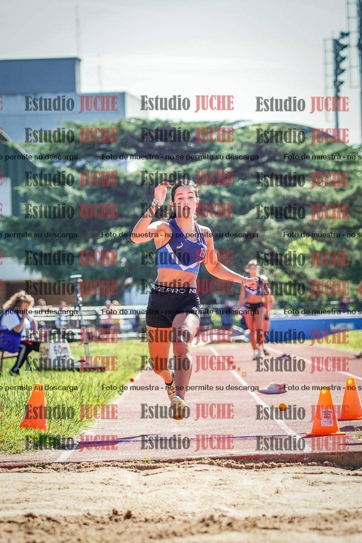 Fotos del salto en largo de mujeres