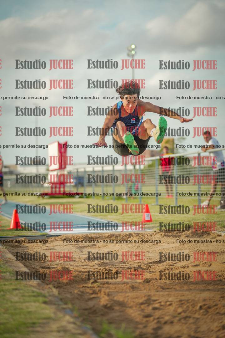Fotos del salto en largo de varones