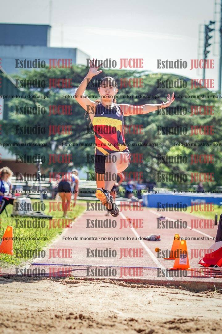 Fotos del salto en largo de mujeres