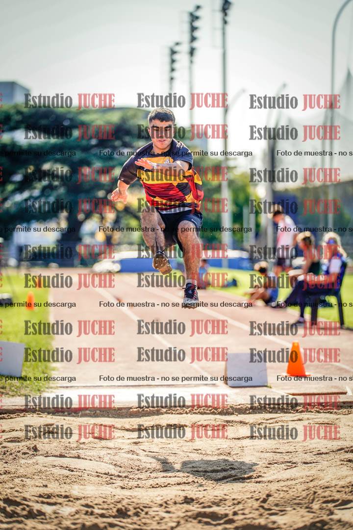 Fotos del salto en largo de varones