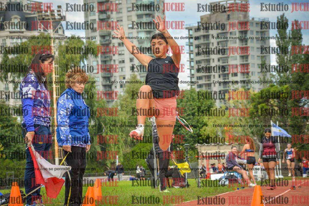 Fotos del salto en largo - mujeres mayores