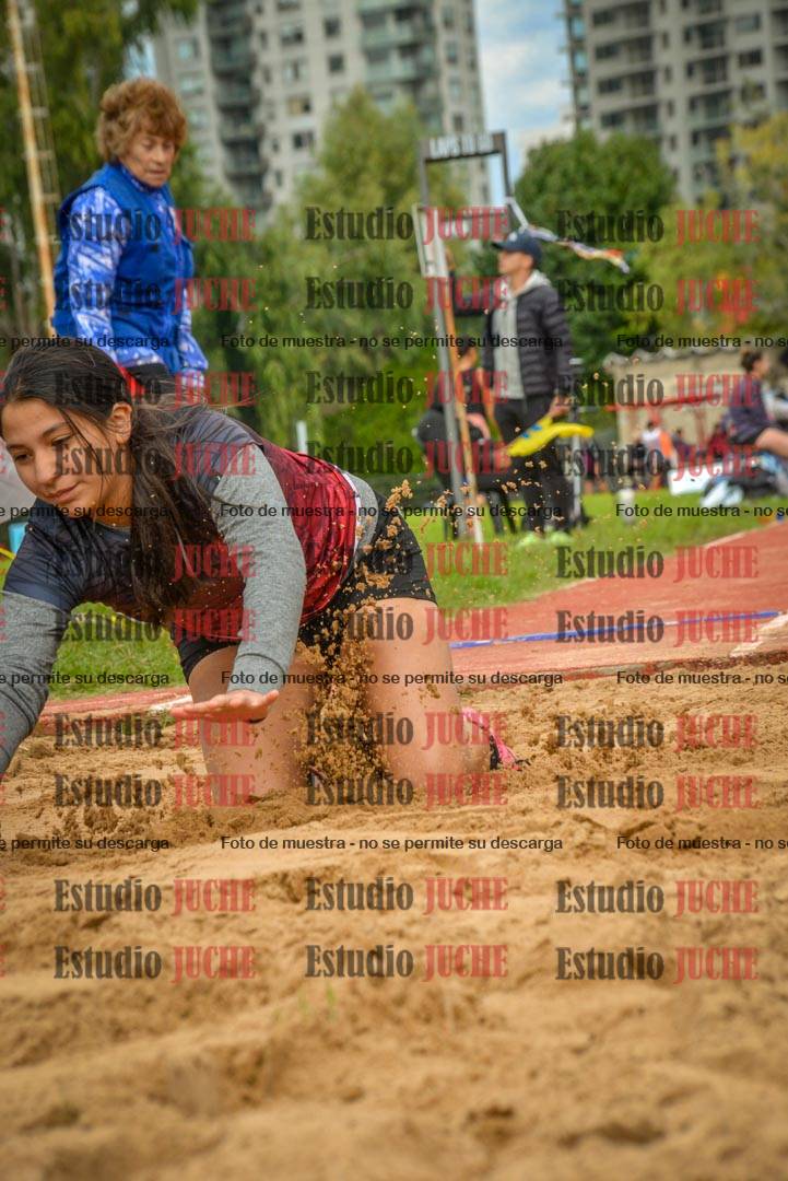 Fotos del salto en largo - mujeres mayores