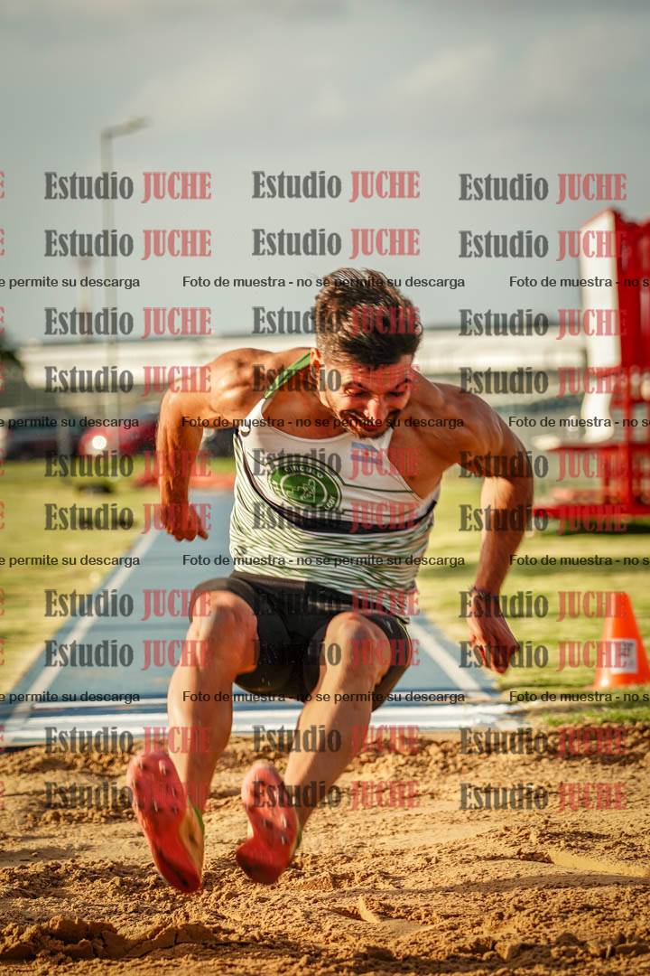 Fotos del salto en largo de varones