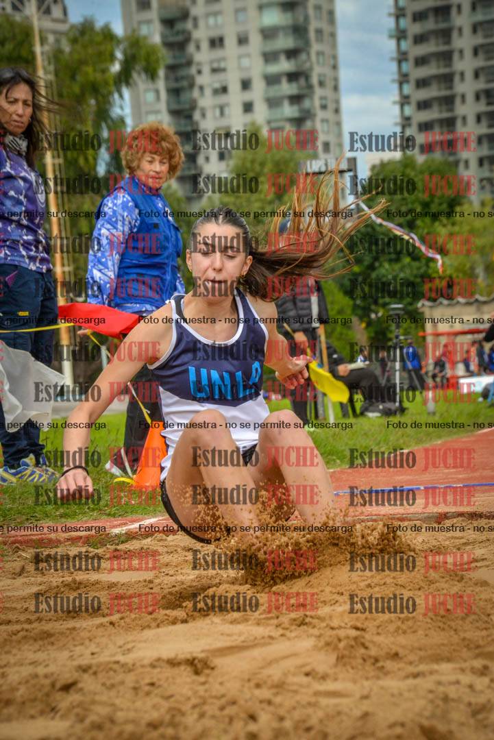 Fotos del salto en largo - mujeres mayores