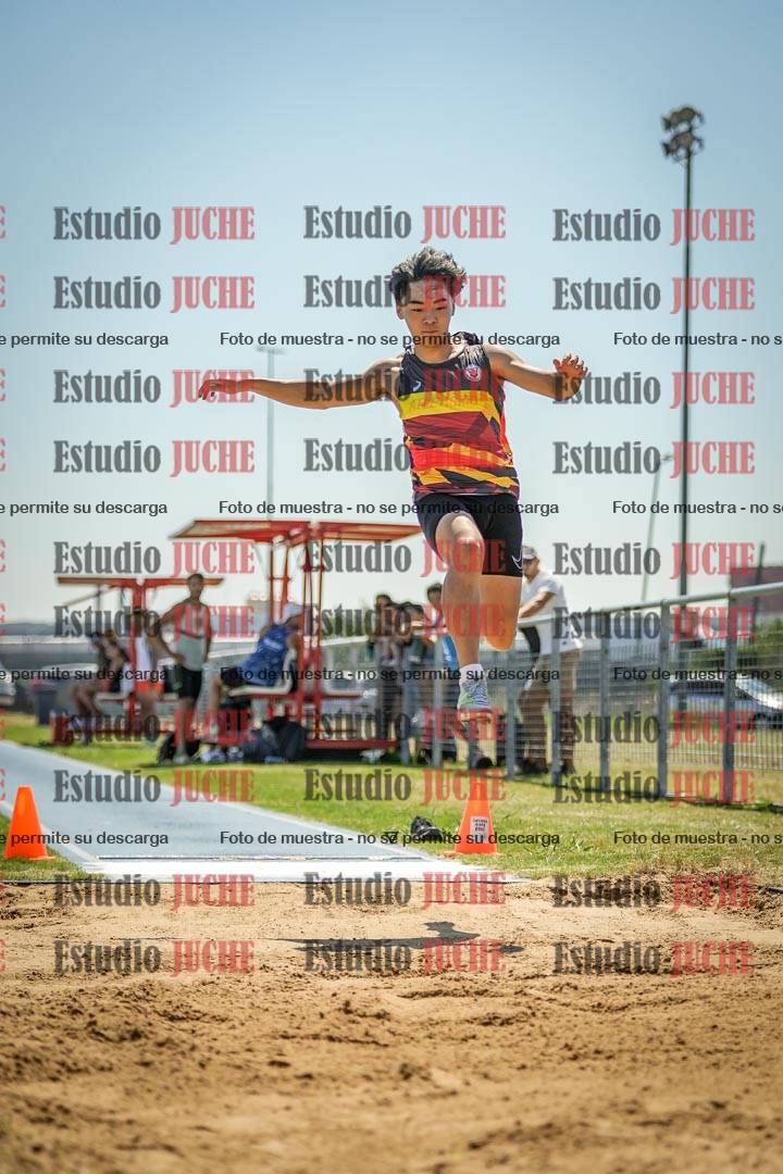 Fotos del salto en largo de varones - mayores