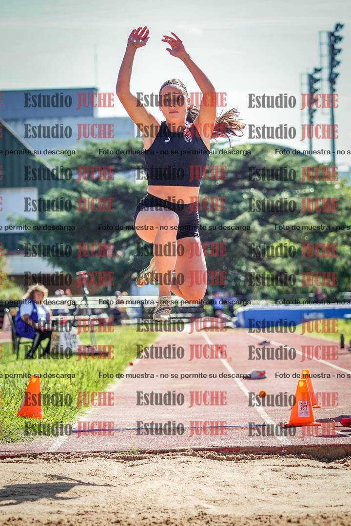 Fotos del salto en largo de mujeres