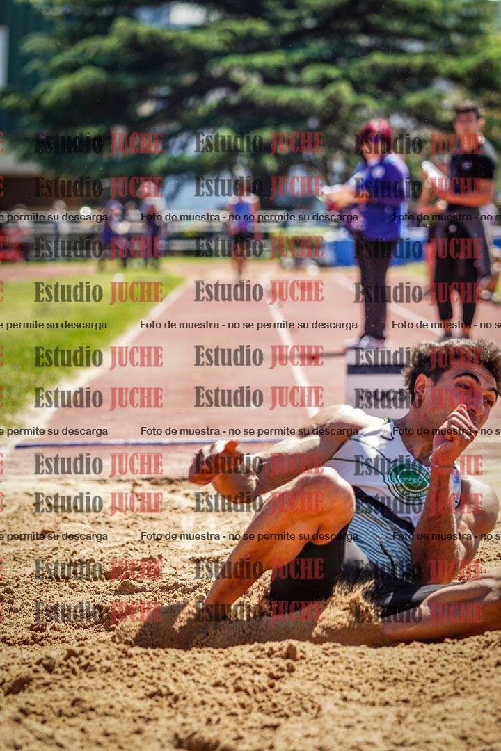 Fotos del salto en largo de varones