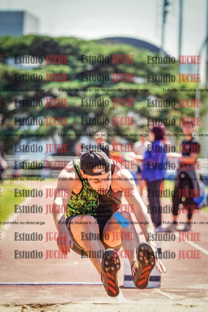 Fotos del salto en largo de varones
