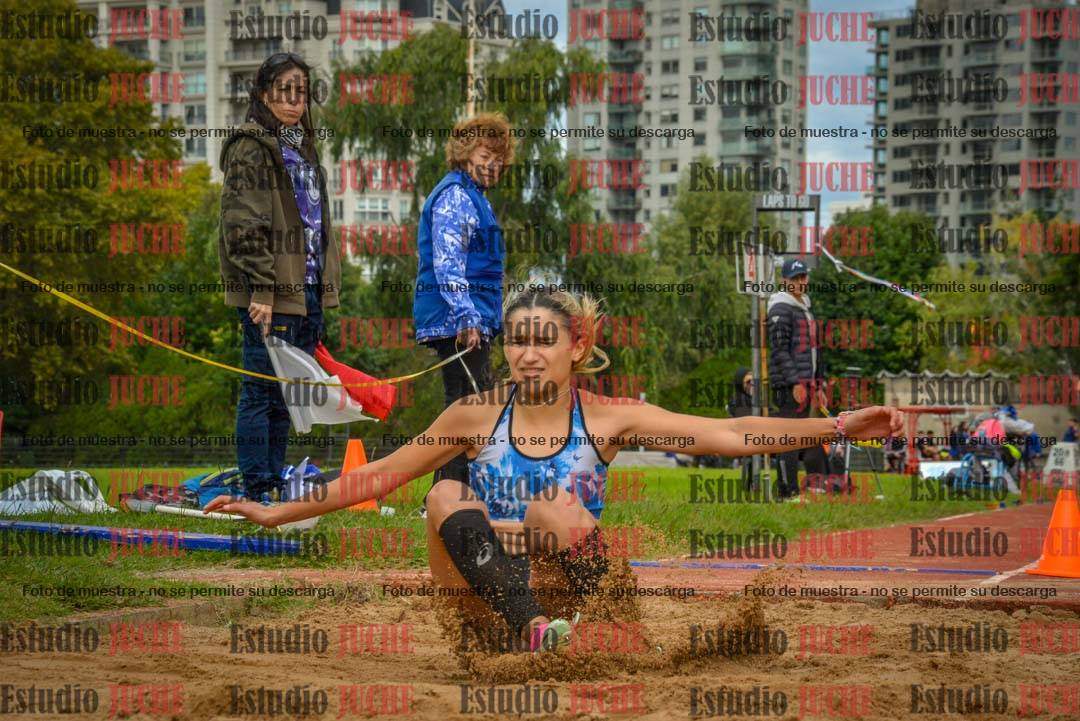 Fotos del salto en largo - mujeres mayores