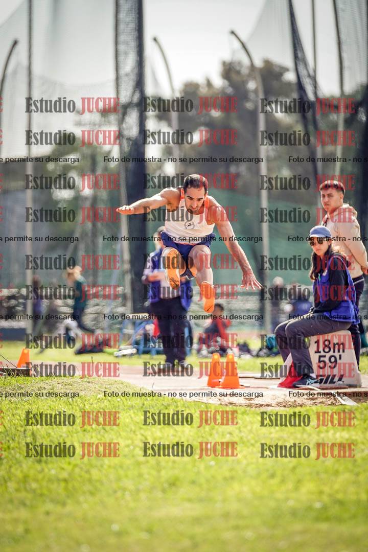 Fotos del salto en largo de varones