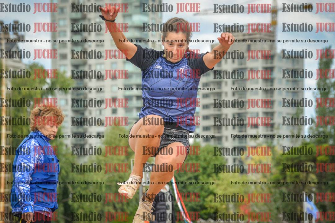Fotos del salto en largo - mujeres mayores