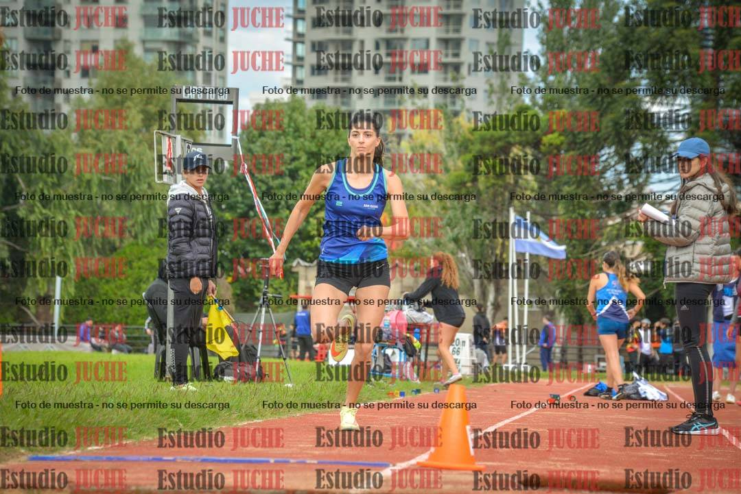 Fotos del salto en largo - mujeres mayores