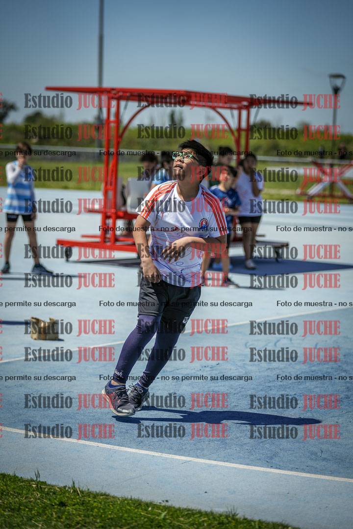 Fotos del lanzamiento de la pelotita de mujeres y varones