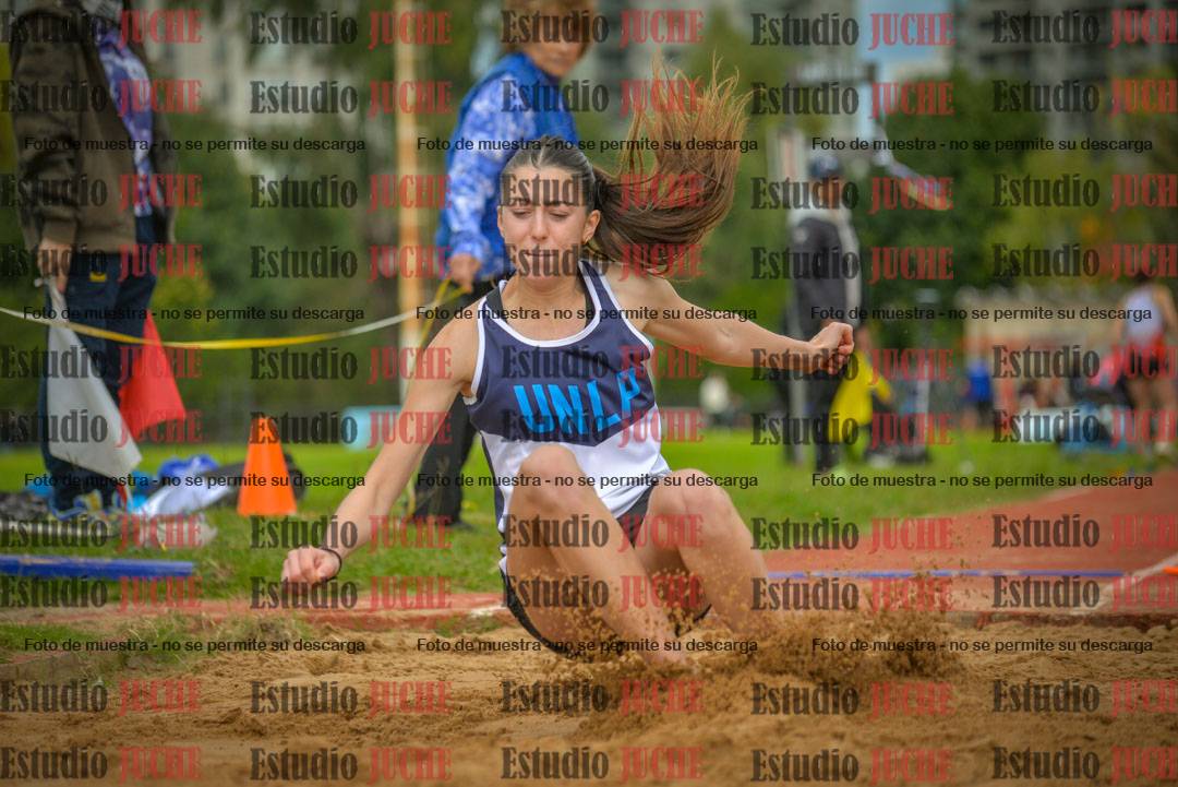 Fotos del salto en largo - mujeres mayores