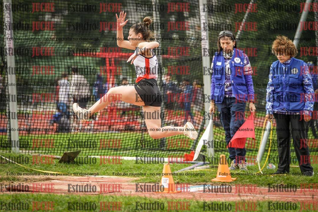Fotos del salto en largo - mujeres mayores