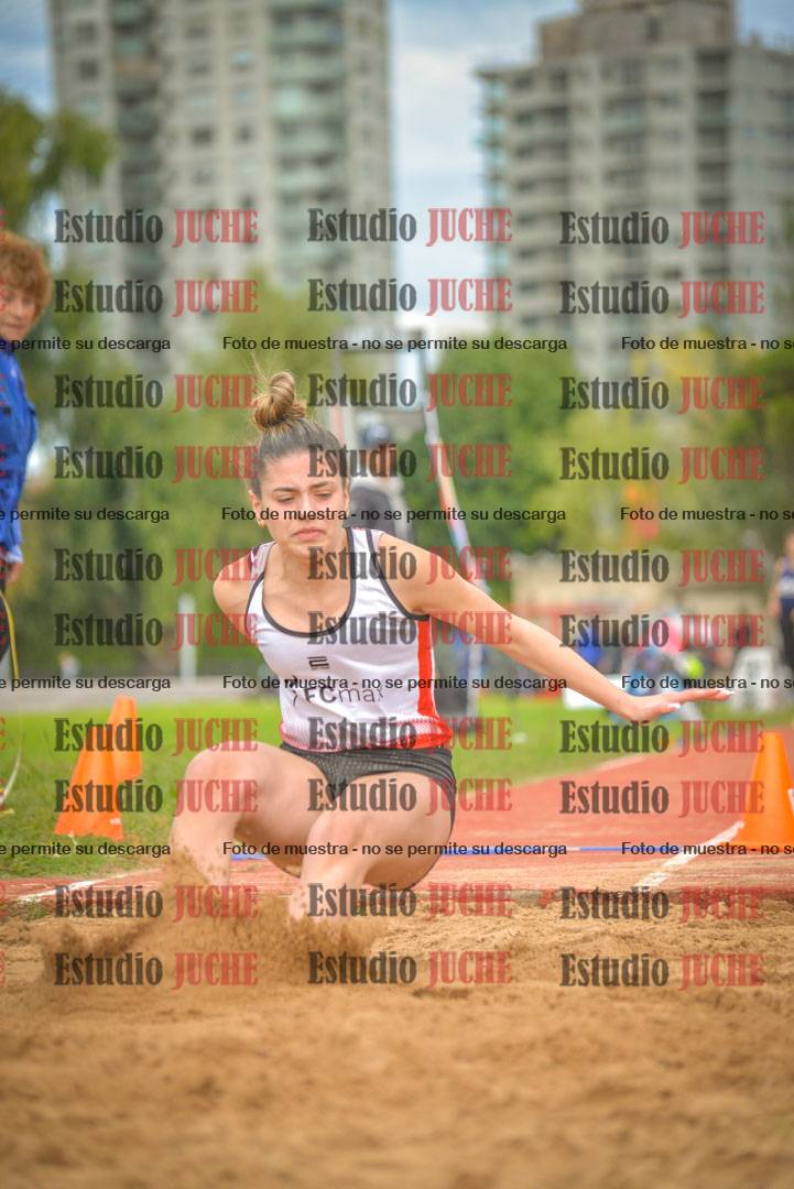 Fotos del salto en largo - mujeres mayores