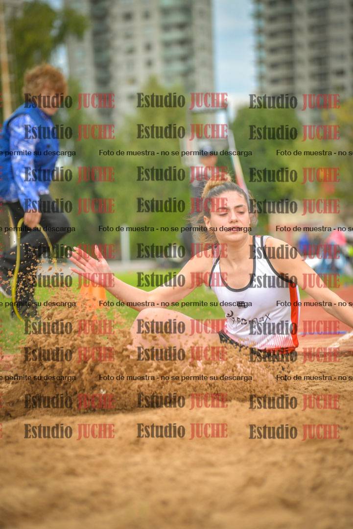 Fotos del salto en largo - mujeres mayores