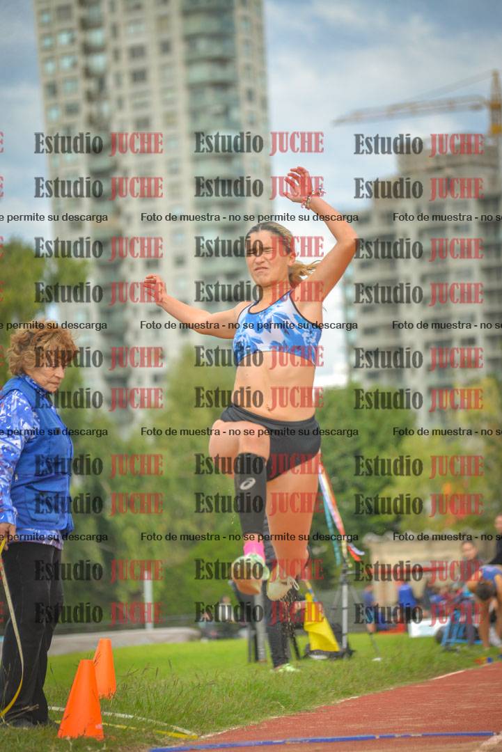 Fotos del salto en largo - mujeres mayores