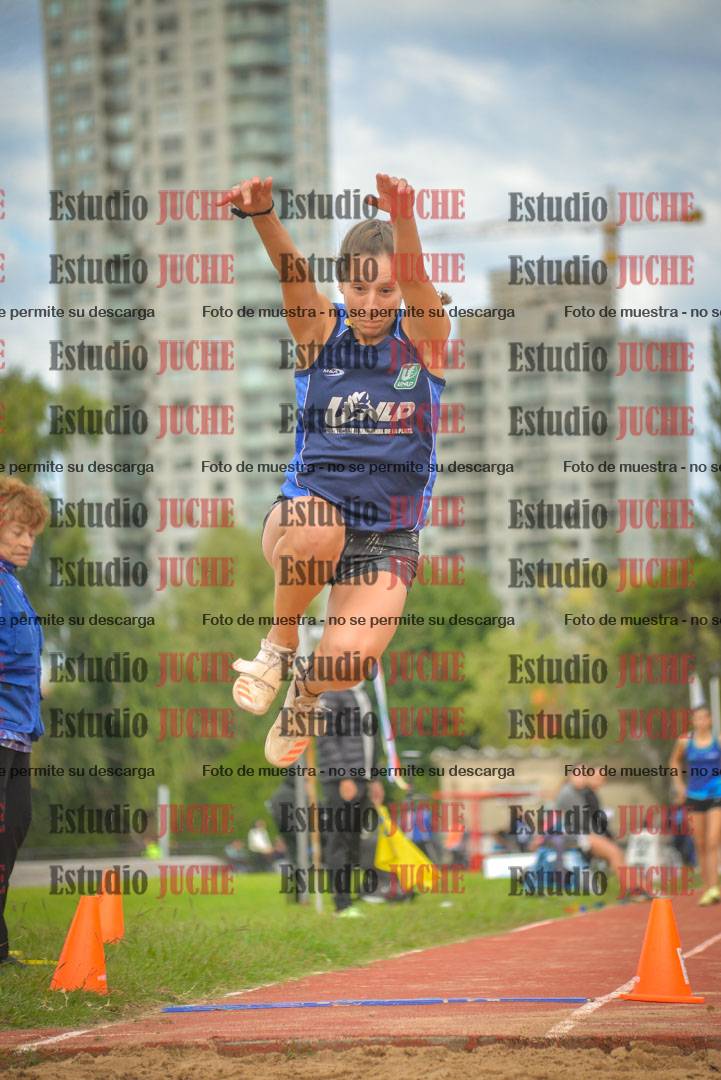 Fotos del salto en largo - mujeres mayores