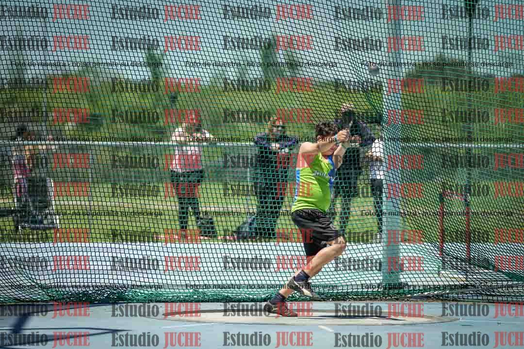 Fotos del lanzamiento del martillo de mujeres y varones - U14