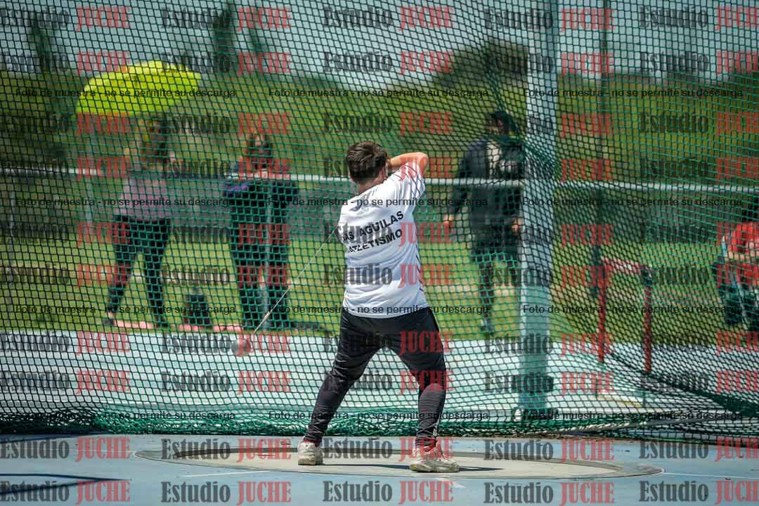 Fotos del lanzamiento del martillo de mujeres y varones - U14