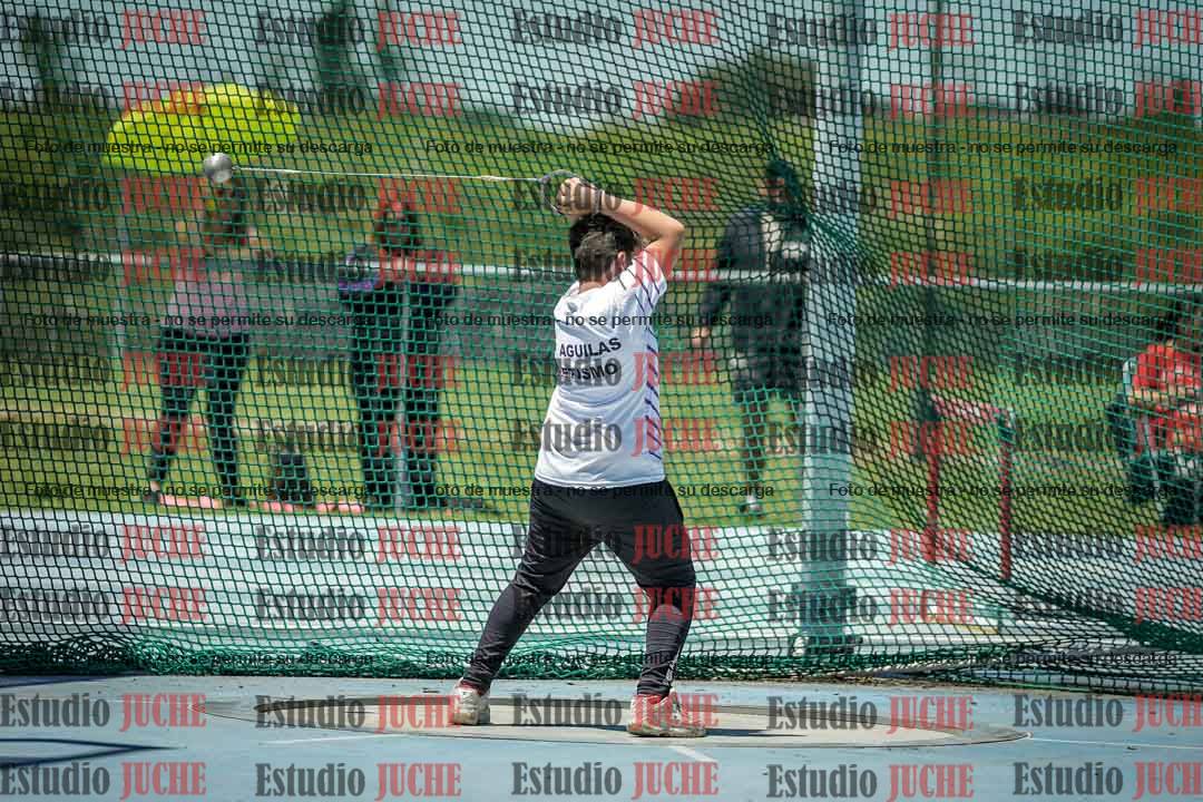 Fotos del lanzamiento del martillo de mujeres y varones - U14