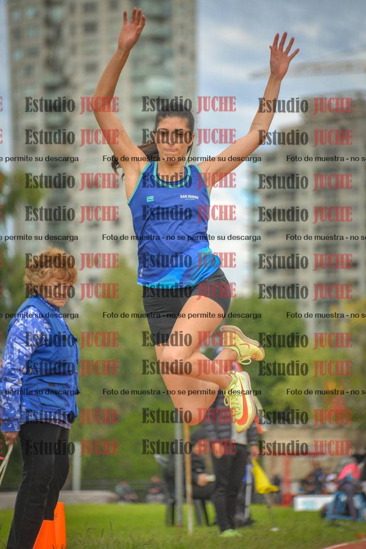 Fotos del salto en largo - mujeres mayores