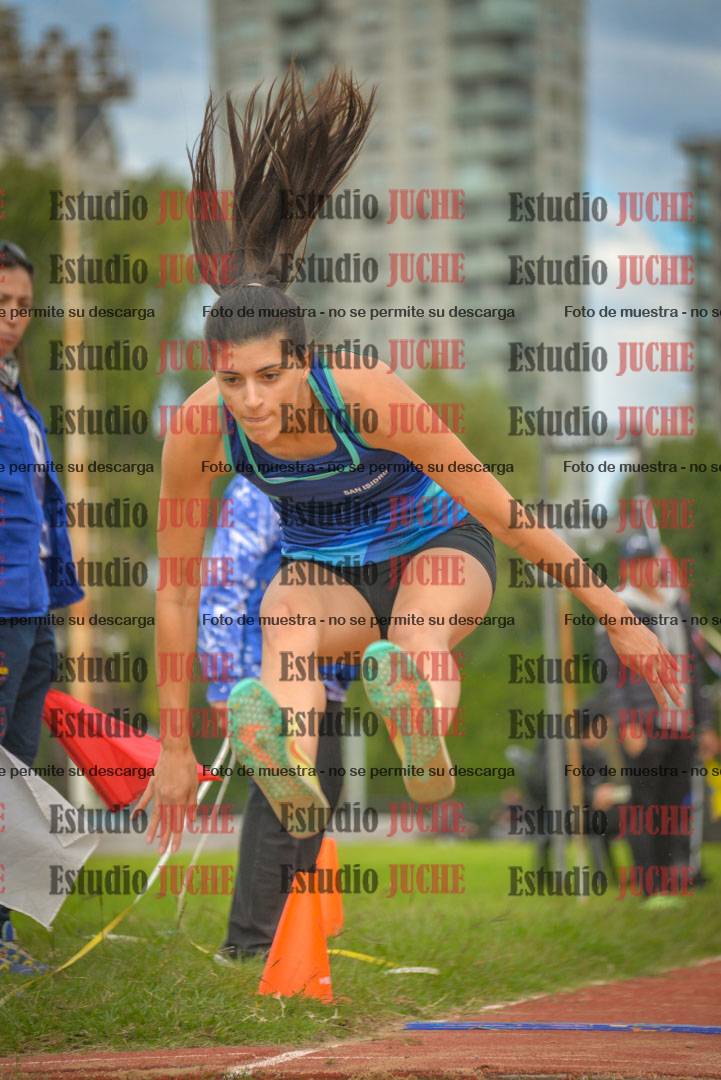 Fotos del salto en largo - mujeres mayores
