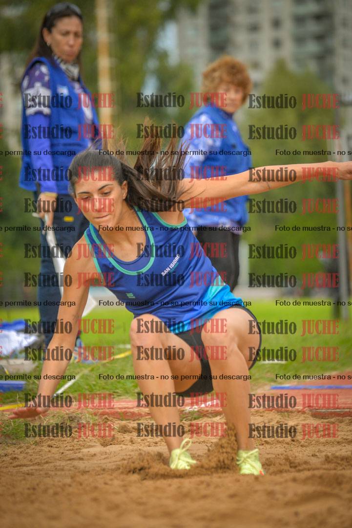 Fotos del salto en largo - mujeres mayores