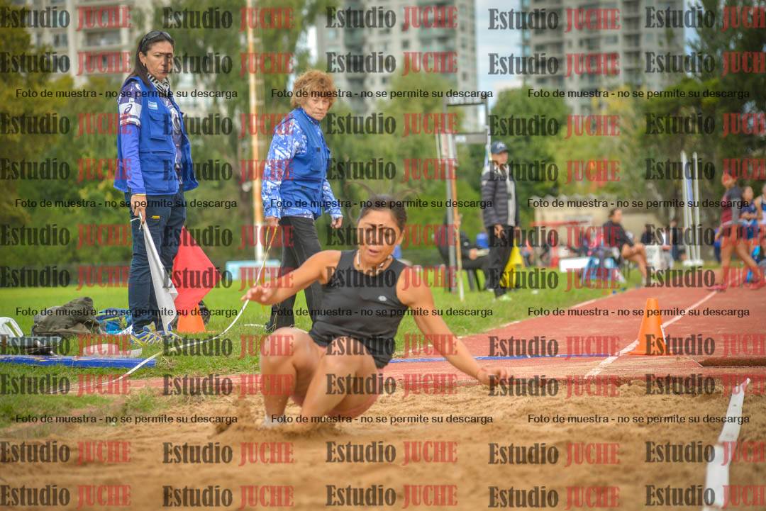 Fotos del salto en largo - mujeres mayores