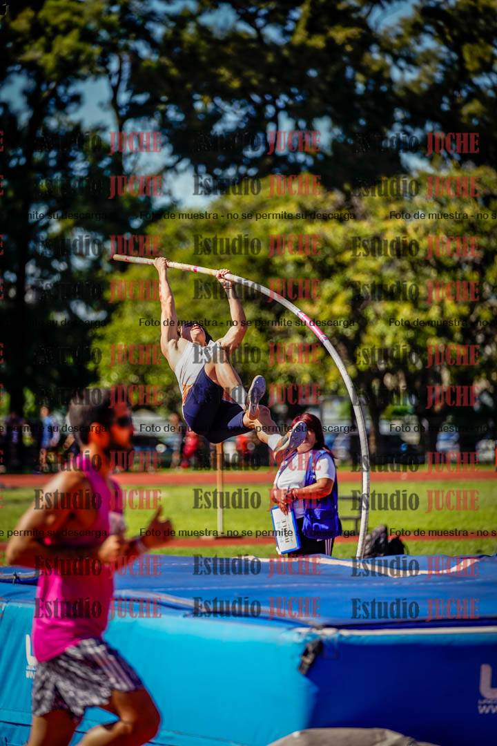 Fotos del salto triple de mujeres y varones
