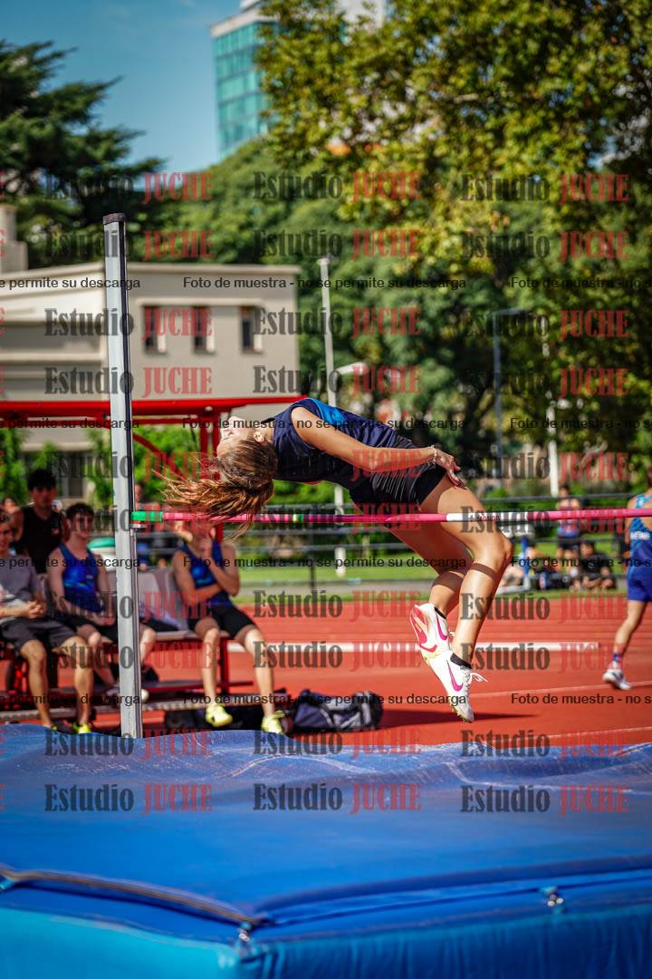 Fotos del salto en alto de mujeres y varones